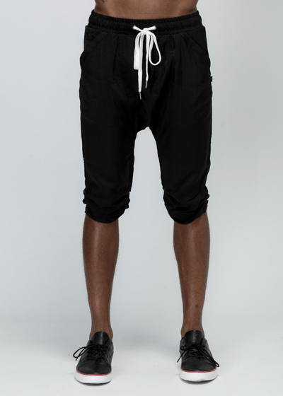 Konus Men's Drop Crotch Over Knee Shorts in Black by Shop at Konus