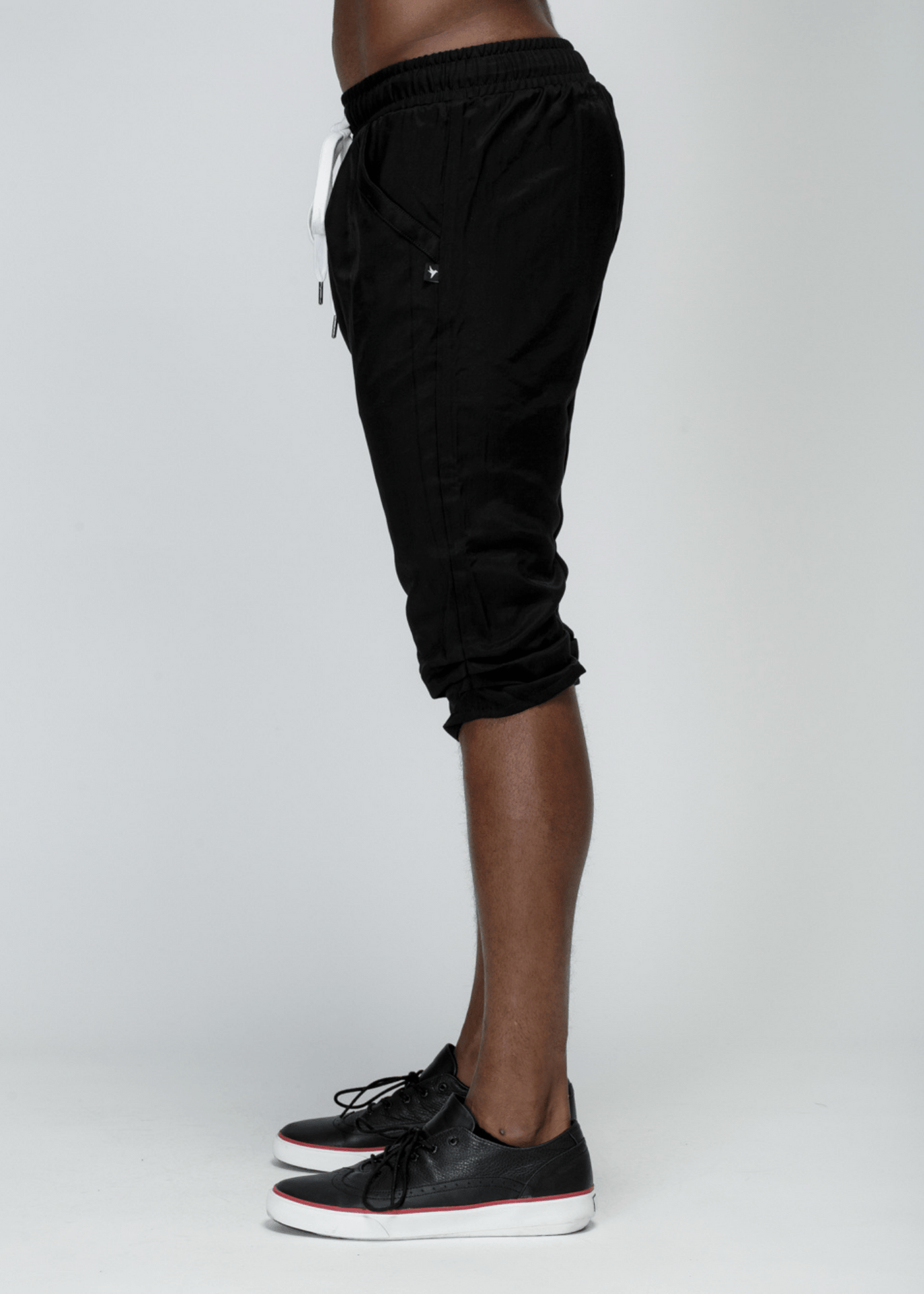 Konus Men's Drop Crotch Over Knee Shorts in Black by Shop at Konus